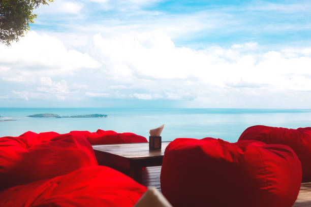 istock comfortable ottomans on top of a mountain with ocean views 1248118926