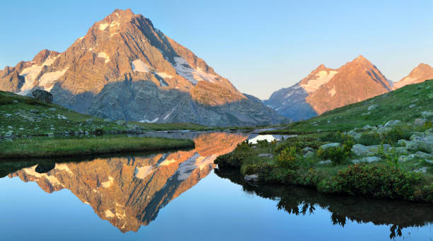 istock Morning at the mountain lake, beautiful reflection, Caucasus 1248122829