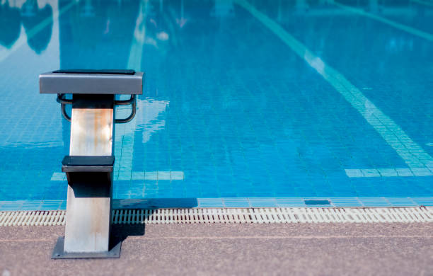 outdoor swimming pool with starting blocks.