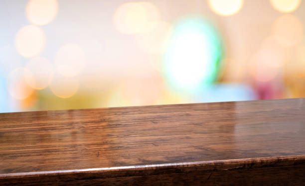 istock Wood diagonal table at restaurant blur background.coffee shop with bokeh light,Mockup  banner for display of product 1248126056