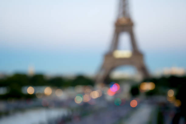 istock Blurred background silhouette eiffel tower in Paris with defocus bokeh and sunset light 1248126217