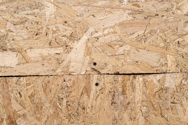 istock Background texture recycled compressed wood Construction hardboard space for text vibrant detail texture 1248130872