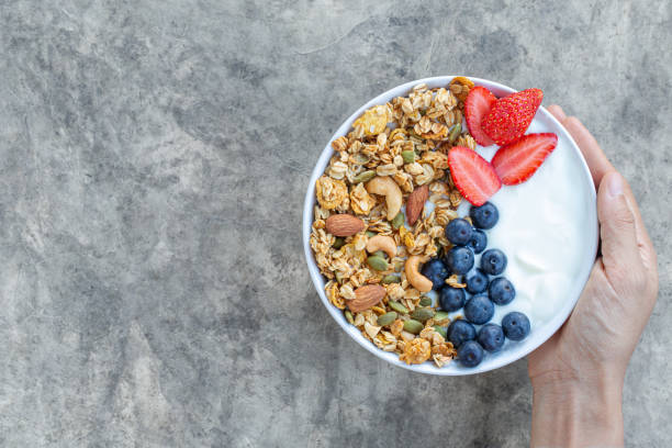 istock Homemade granola with yogurt and fresh berries 1248135447