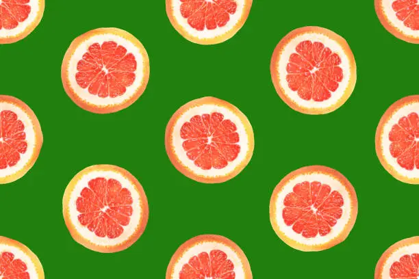 Seamless pattern from round slices of ripe juicy pink grapefruit on green background. Poster banner template backdrop for wallpaper product surface design tropical theme