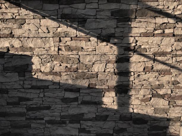 background shadow steps on the wall of artificial stone.