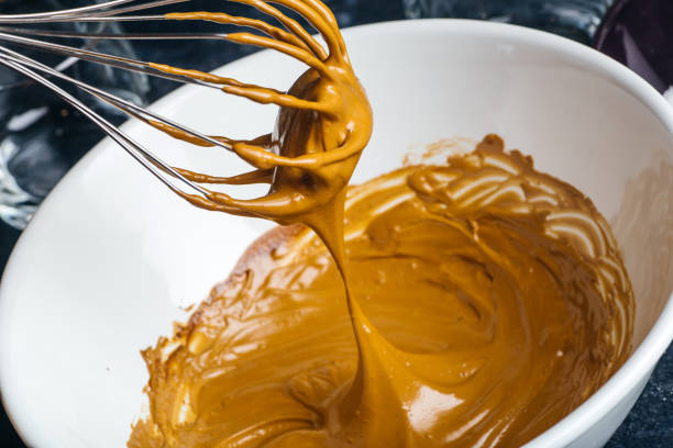 istock Dalgona coffee drink background. Korean coffee drink made with whipped instant coffee, sugar and milk. 1248138229