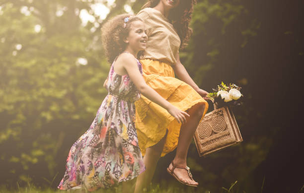 istock Mother and daughter free in nature. 1248145931