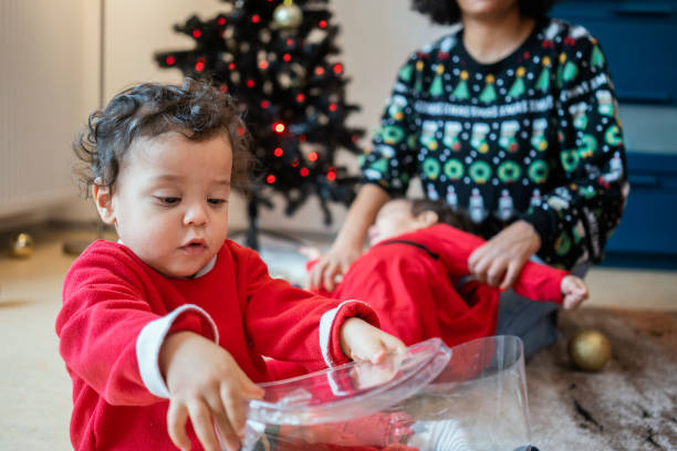 istock Mom and babies at home for Christmas 1248153939
