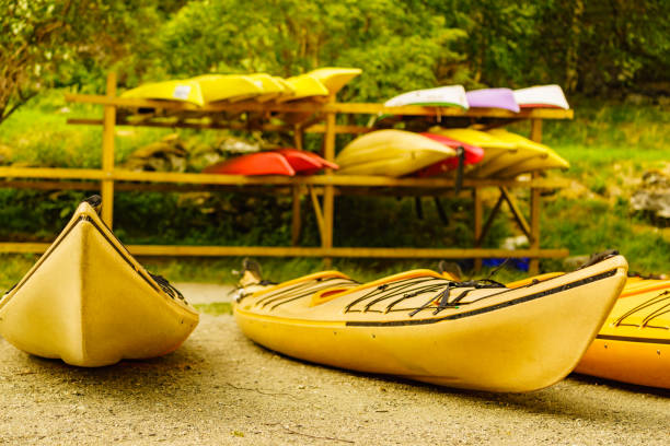istock Kayaks on water shore. Rental area 1248156211