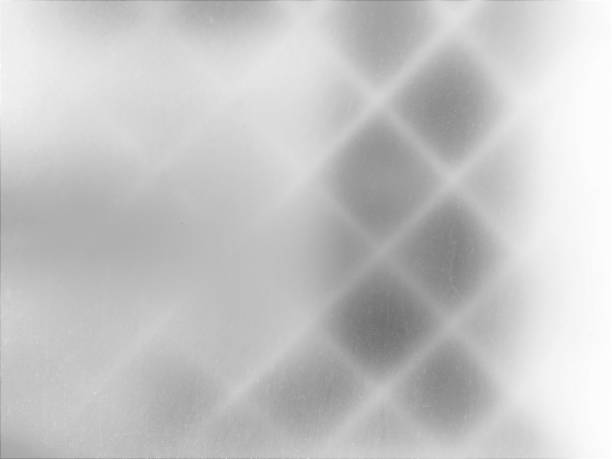 istock background texture is a white-colored window in a white building with a grille in the form of squares inside 1248158652