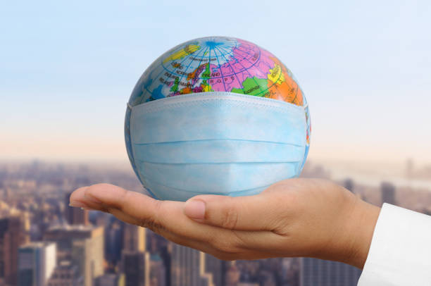 istock Globe in COVID-19 crisis 1248161225
