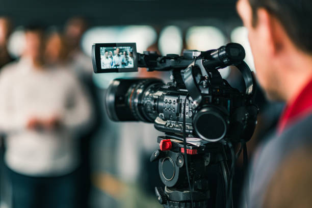 istock Close-Up Of Cameraman Filming In Studio 1248161270