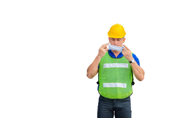 istock Engineer man wearing protection face mask against coronavirus, man with clipping path on white background 1248165891