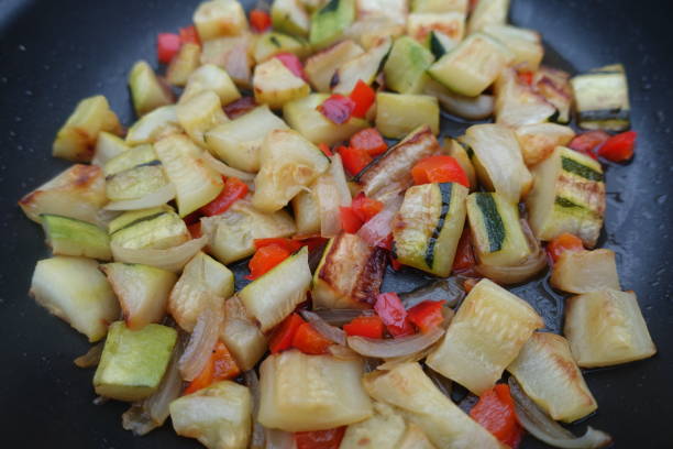 istock Fried Zucchini Red pepper and onion 1248167360