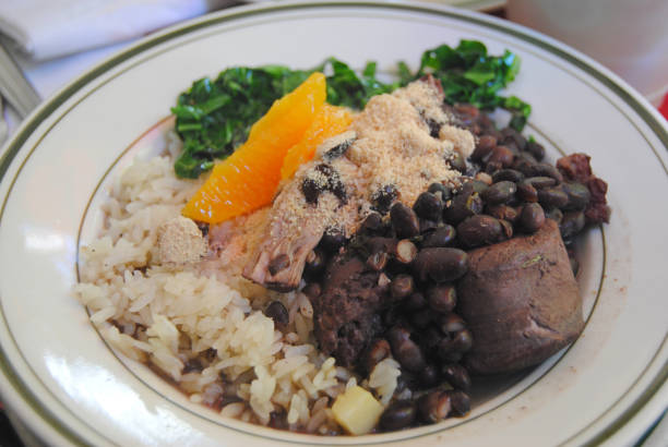 istock Brazilian feijoada stew with black beans, beef and rice. 1248176110