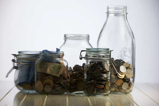 saving jar on the white table