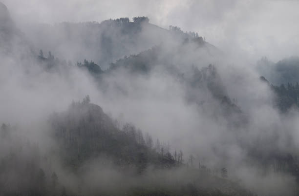 istock Mountains in the clouds, natural backgrounds 1248176311