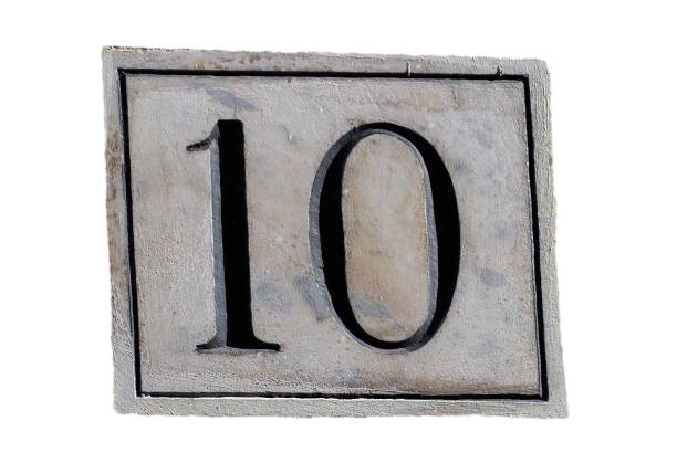 istock Number 10 black lettering on grey marble plaque 1248176345