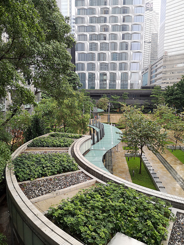 Park surrounded by modern office skyscrapers in in the Wan Chai District of Hong Kong.