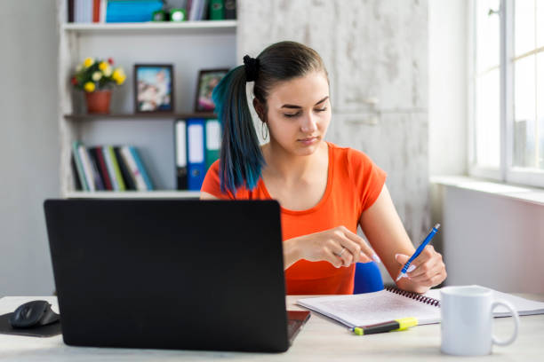 istock Freelancer with a laptop, working from home. 1248178892