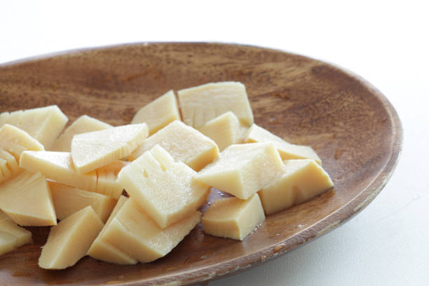 istock Boiled bamboo shoots on wooden plate with copy space 1248180434
