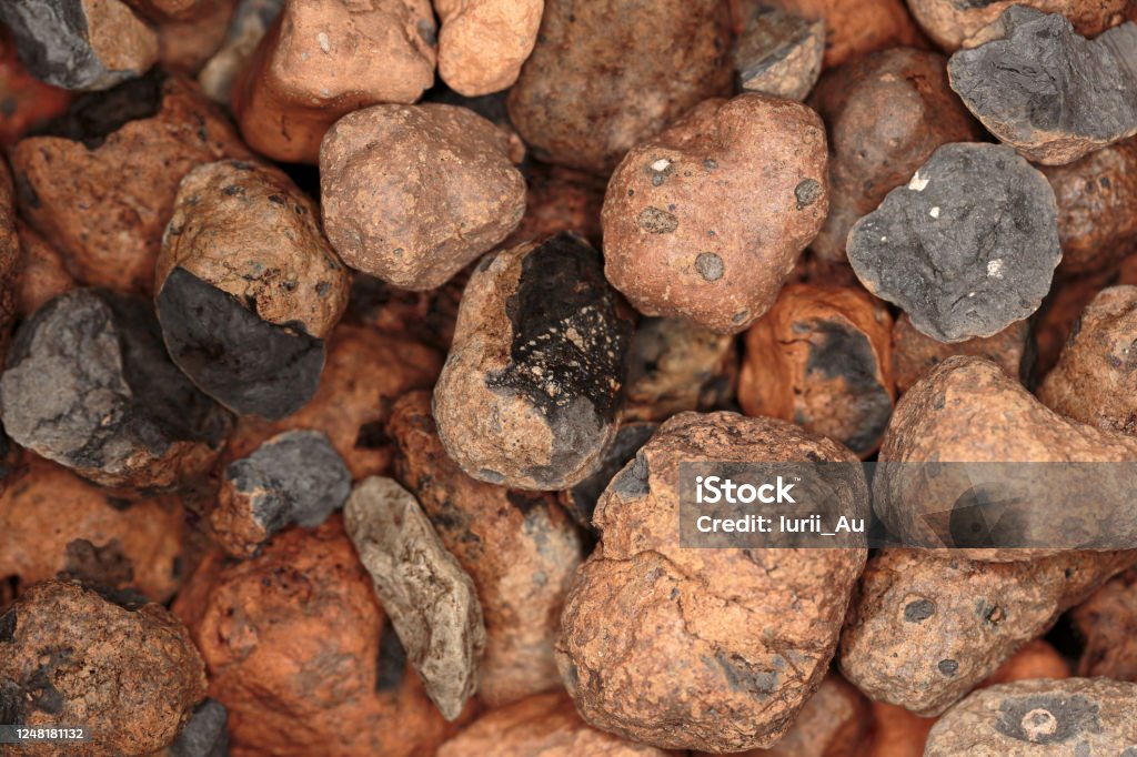 Background of expanded clay pebbles close-up Background of expanded clay pebbles close-up, view from above Gardening Stock Photo
