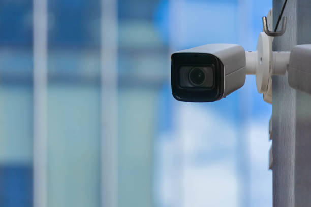 istock CCTV security camera on modern building wall in city 1248182036