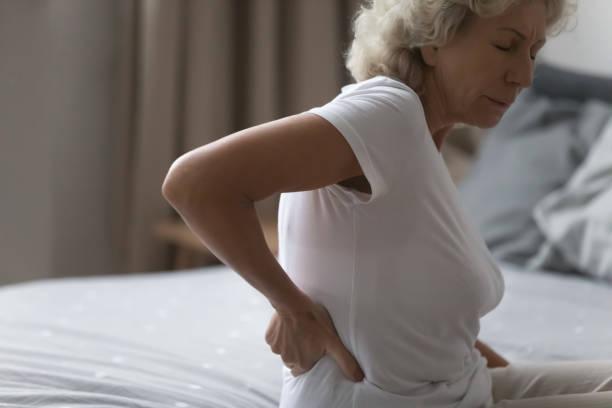 istock Unwell elderly woman struggle with arthritis at home 1248182196