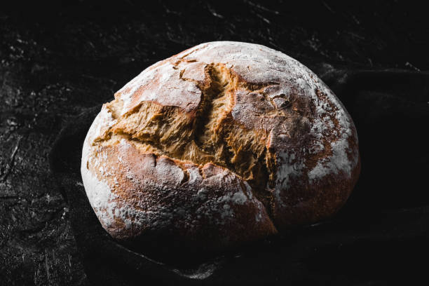 istock dark homemade bread dusted with flour 1248185129