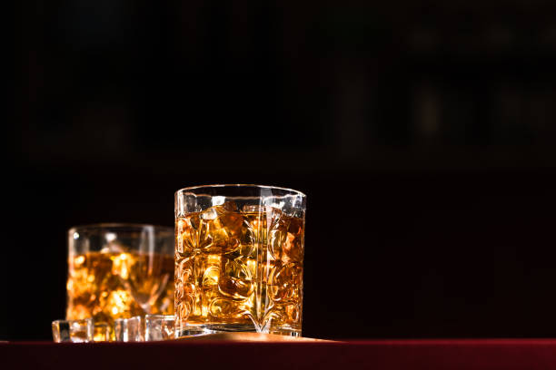 istock Whiskey glasses with ice in a lounge bar 1248187218