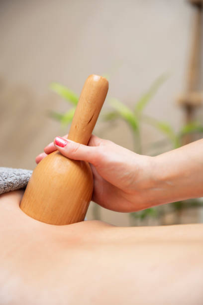 istock Maderotherapy massage with wooden swedish cup 1248187403