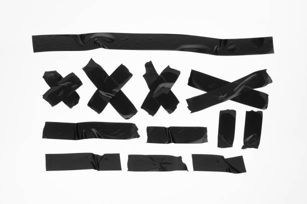 istock Black adhesive duct tape isolated on white background, collection 1248188980