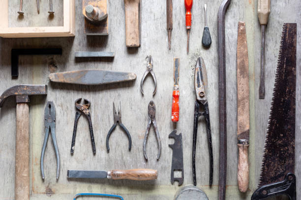 istock Set of hand various work tools on wooden background 1248190592