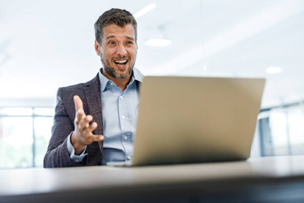 istock Frustrated businessman having problems during conference call in the office. 1248190722