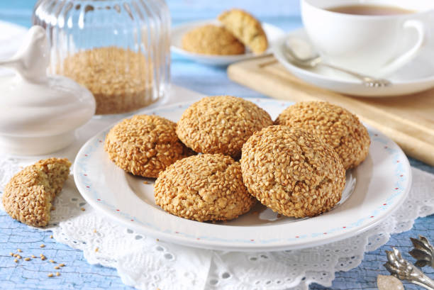 istock Sesame cookies and cup of tea 1248191325