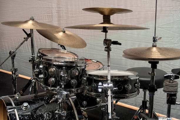 istock Drum Set with some cymbals on stage before a live Concert. 1248192155