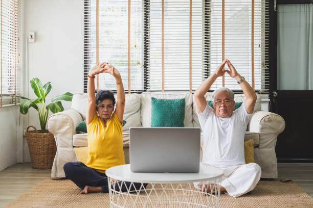 istock Asian old senior workout exercise and doing yoga at home 1248192483
