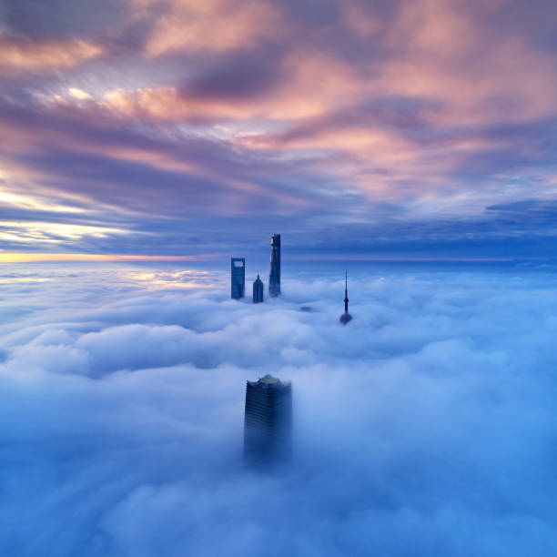 istock Aerial View of Shanghai Skyline on Thick Cloud, China 1248196803