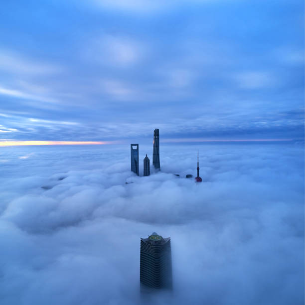 istock Aerial View of Shanghai Skyline on Thick Cloud, China 1248196975