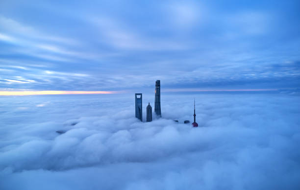 istock Aerial View of Shanghai Skyline on Thick Cloud, China 1248196993