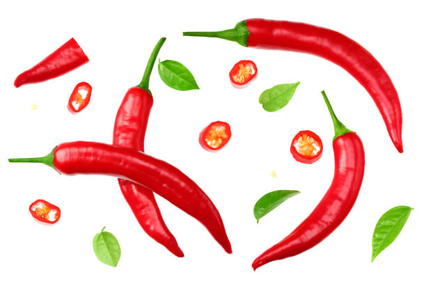istock sliced red hot chili peppers isolated on white background top view 1248197422