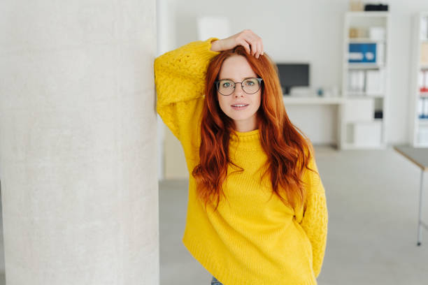 istock Thoughtful young woman staring at the camera 1248202417