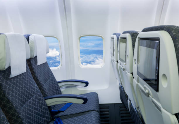 istock Empty airplane seats in the cabin economy class. 1248211736