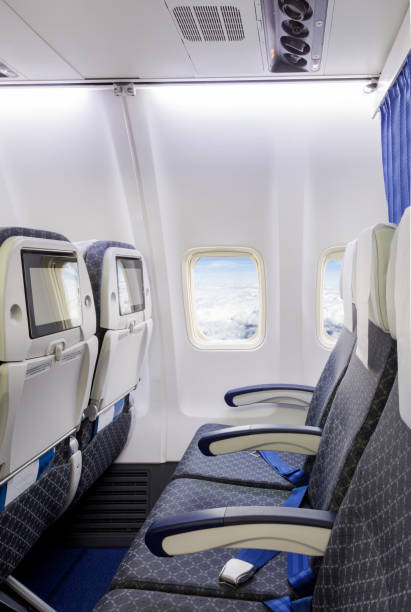 istock Empty airplane seats in the cabin economy class. 1248211746