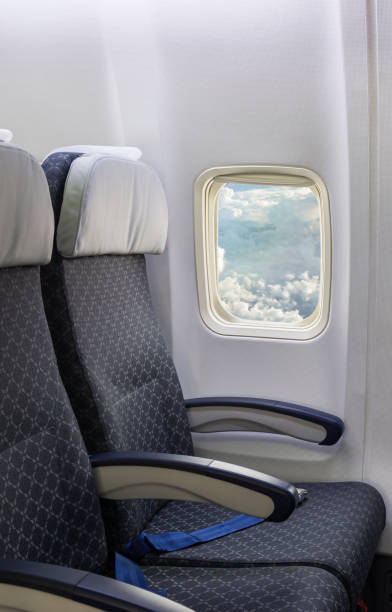 istock Empty airplane seats in the cabin economy class. 1248211787