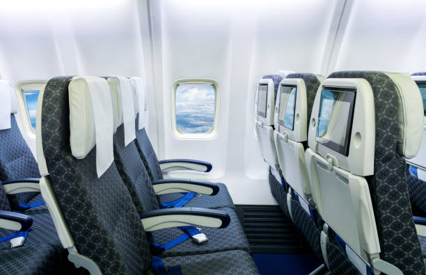 istock Empty airplane seats in the cabin economy class. 1248211788