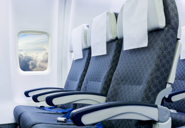 istock Empty airplane seats in the cabin economy class. 1248211819