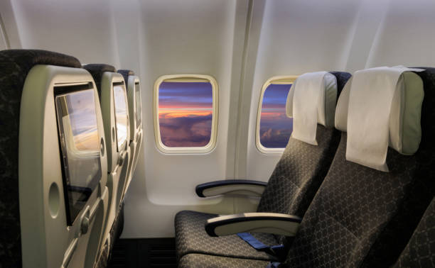 istock Empty airplane seats in the cabin economy class. 1248211900