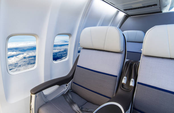 istock Seat rows in an airplane cabin 1248211939
