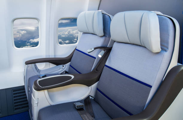 istock Seat rows in an airplane cabin 1248211957